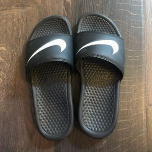 Gently used Nike slides.